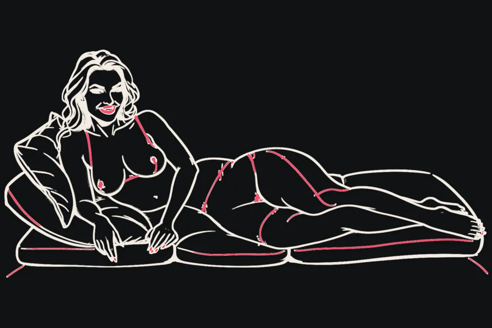 A plus-size woman reclines confidently on cushions