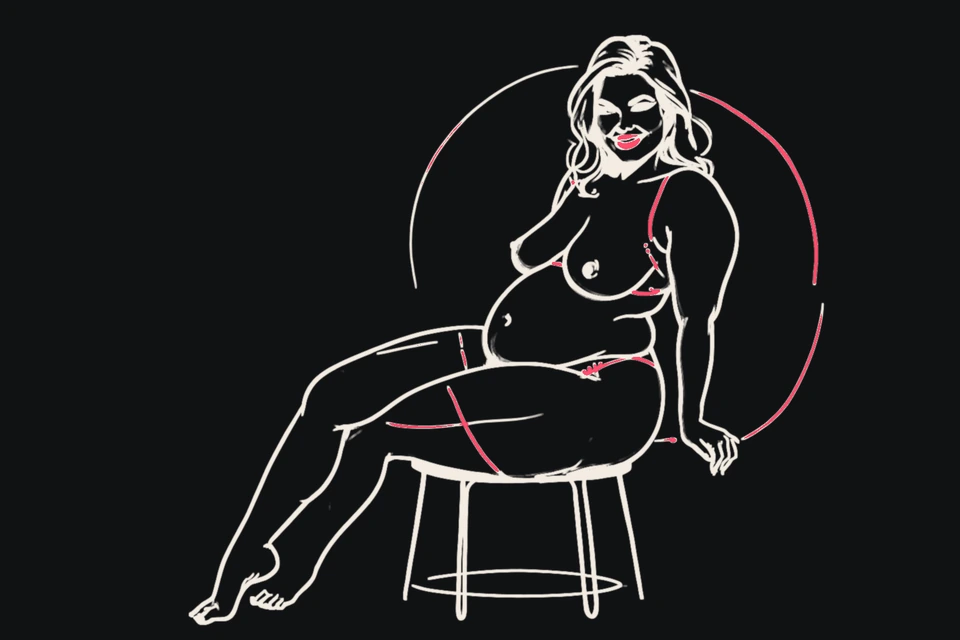 A soft-figured woman sits on a stool, smiling