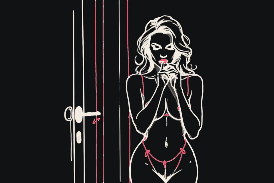 A woman holds a finger to her lips beside a door ajar