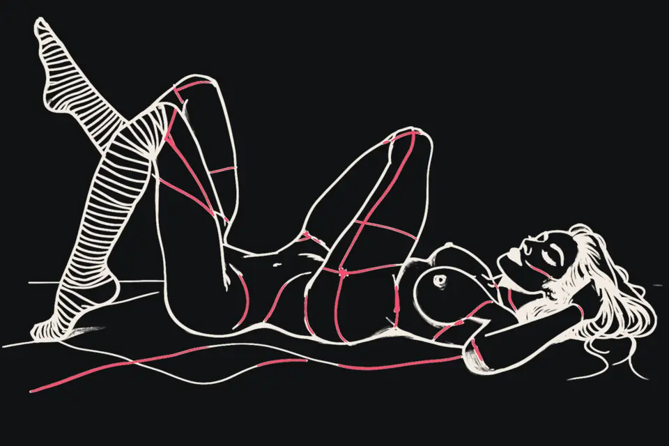 A woman lies on her back with legs up in striped knee socks