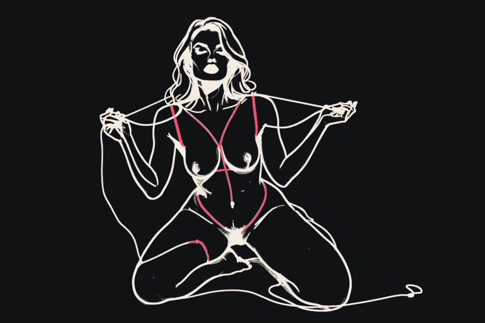 A kneeling woman offers up a leash