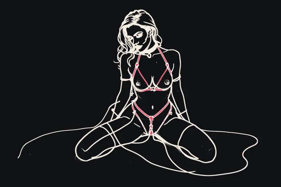 A kneeling woman in a harness and collar with her wrists tied